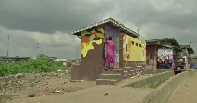 Gani Taiwo; Lagos Artist’s Colorful Murals on Slum’s Public Toilets Project Settlement’s Profile
