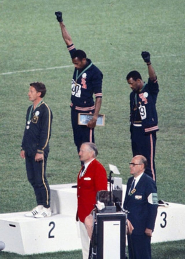 October 16, 1968 – Sprinters Tommie Smith and John Carlos give Black Power salute during Olympics medal ceremony
